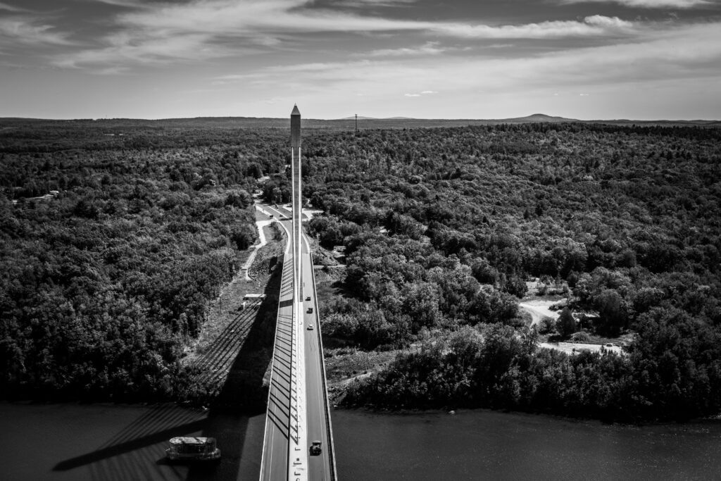 black and white aerial photo of Penobscot Narrows Bridge & Observatory