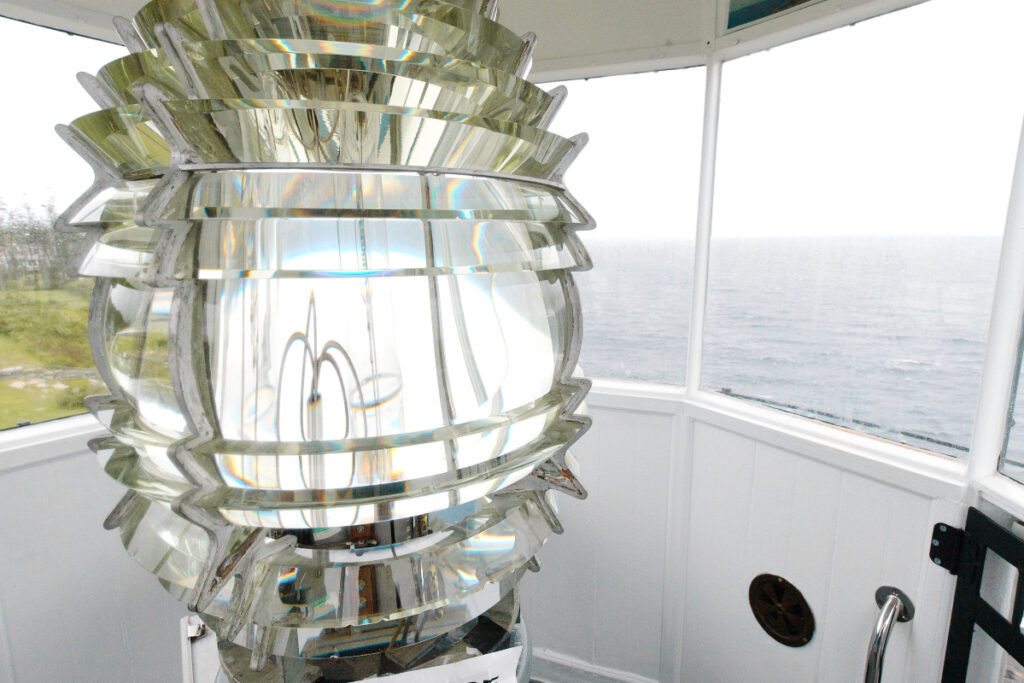 Fresnal lens in lighthouse at Pemaquid Point Maine