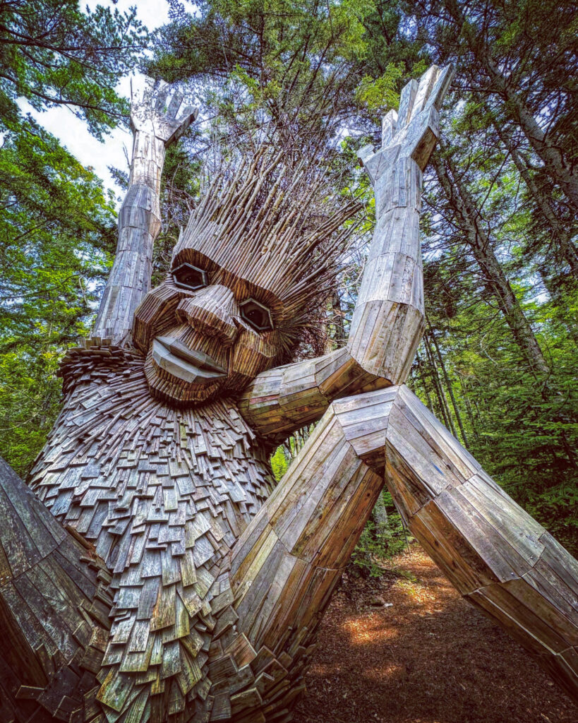 Boothbay, Maine - July 12,2023 : Famous Giant Wooden Trolls at Coastal Maine Botanical Gardens in Boothbay, Maine USA