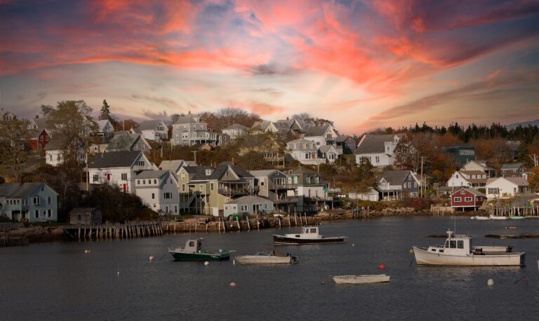 Stonington, Maine - 10-27-2006:Lobster boats at anchor and bay front homes, Stonington, Maine